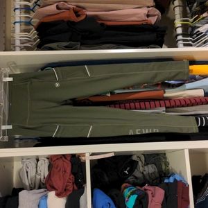 Alpha Forward thick compression leggings with reflective accents and pockets